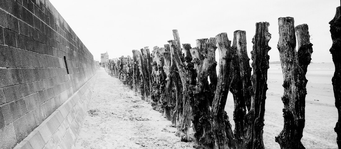 Wall and wooden post at the beach in Brittany, France