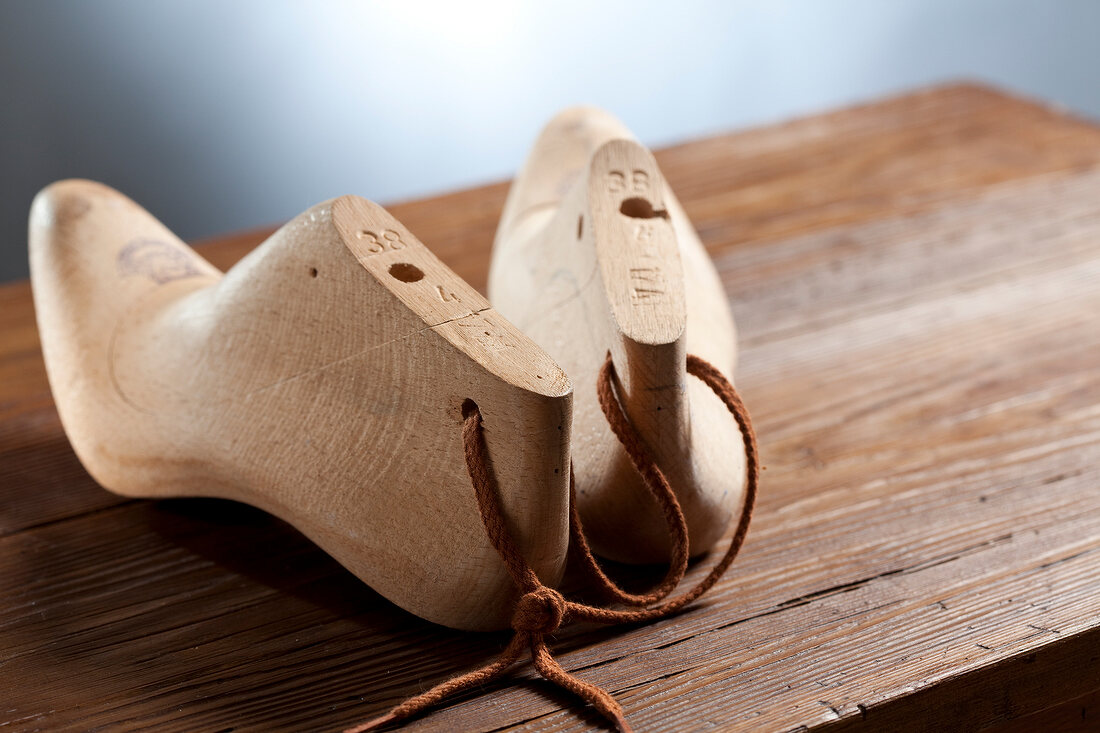 Wooden clogs as tools of shoemaker