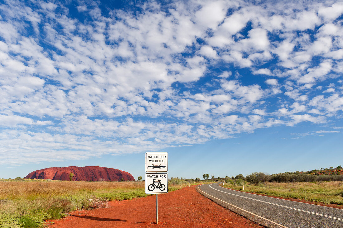 Sign board showing directions of Uluru-Kata Tjuta National Park in Australia