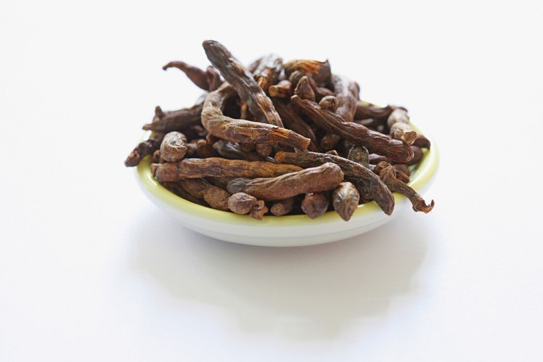 Selim pepper in a bowl on a white surface