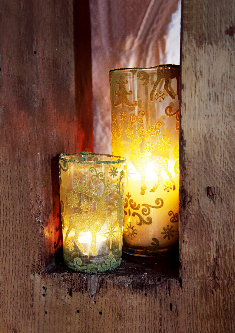 Lighted lanterns made of transparent fabric with fairy forest pattern