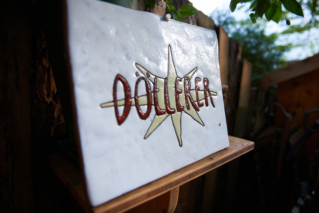 Close-up of nameplate of Dollerers Pleasure Hotel, Golling, Salzburg, Austria