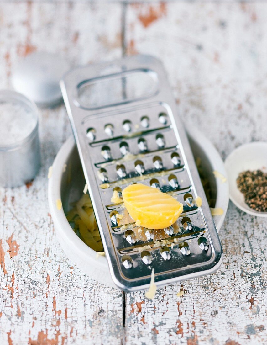 Potatoes being grated