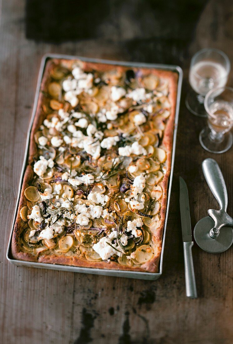 Potato pizza with sheep's cheese and rosemary