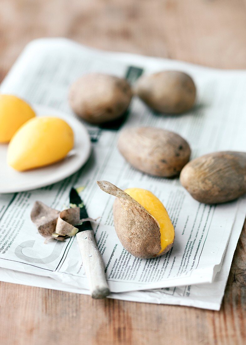 Potatoes being peeled