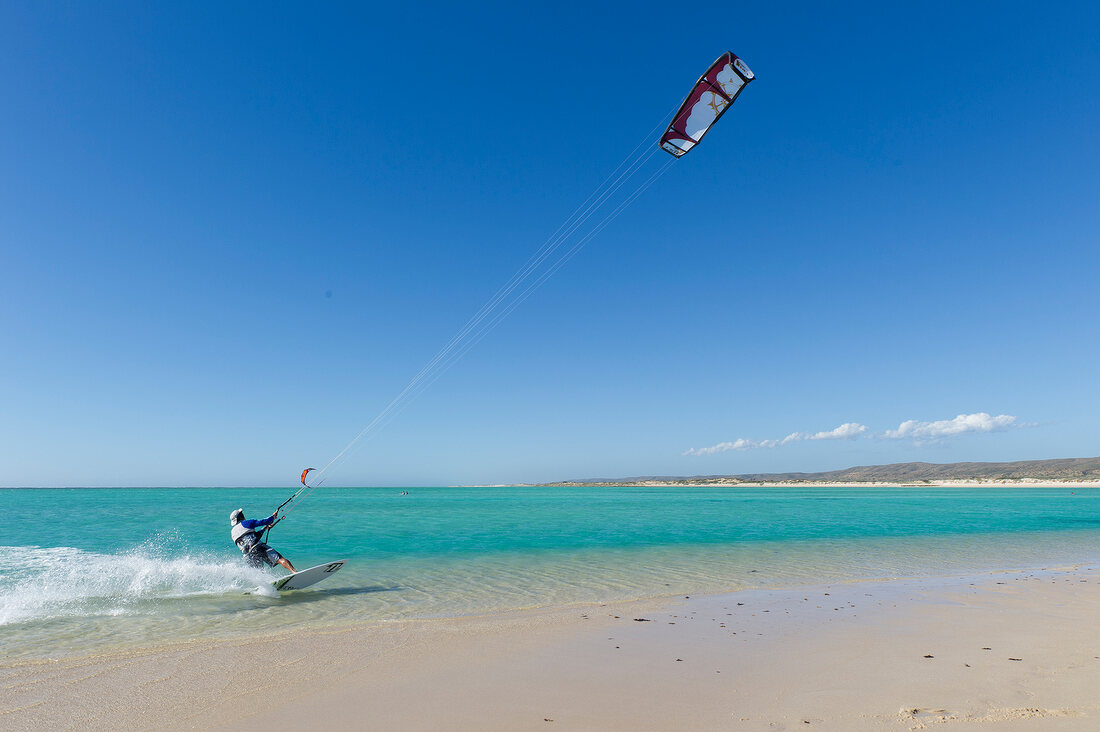 Man paragliding at Ningaloo Reef in Australia