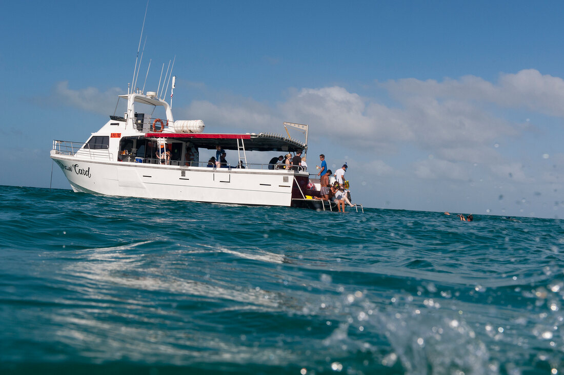 People on boat at Ningaloo Reef in Australia