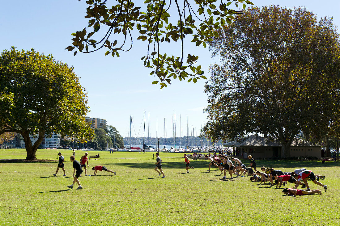 People doing rugby training near Rushcutters Bay in Sydney, New South Wales, Australia