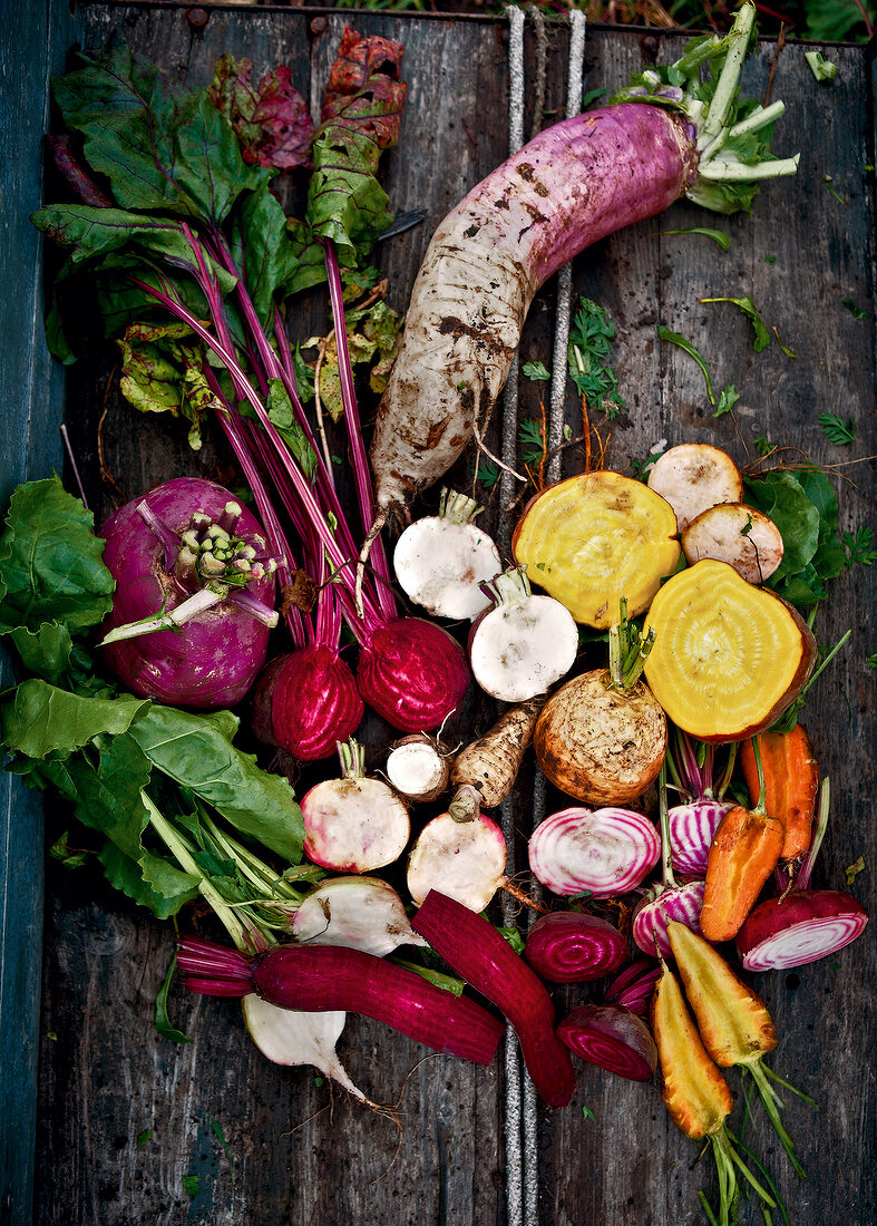 Halved healthy vegetables on table