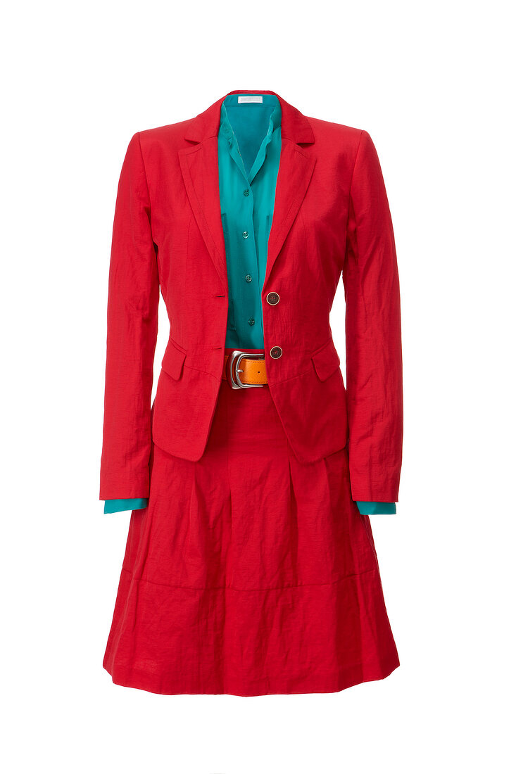 Red blazer, flared skirt with green shirt on white background