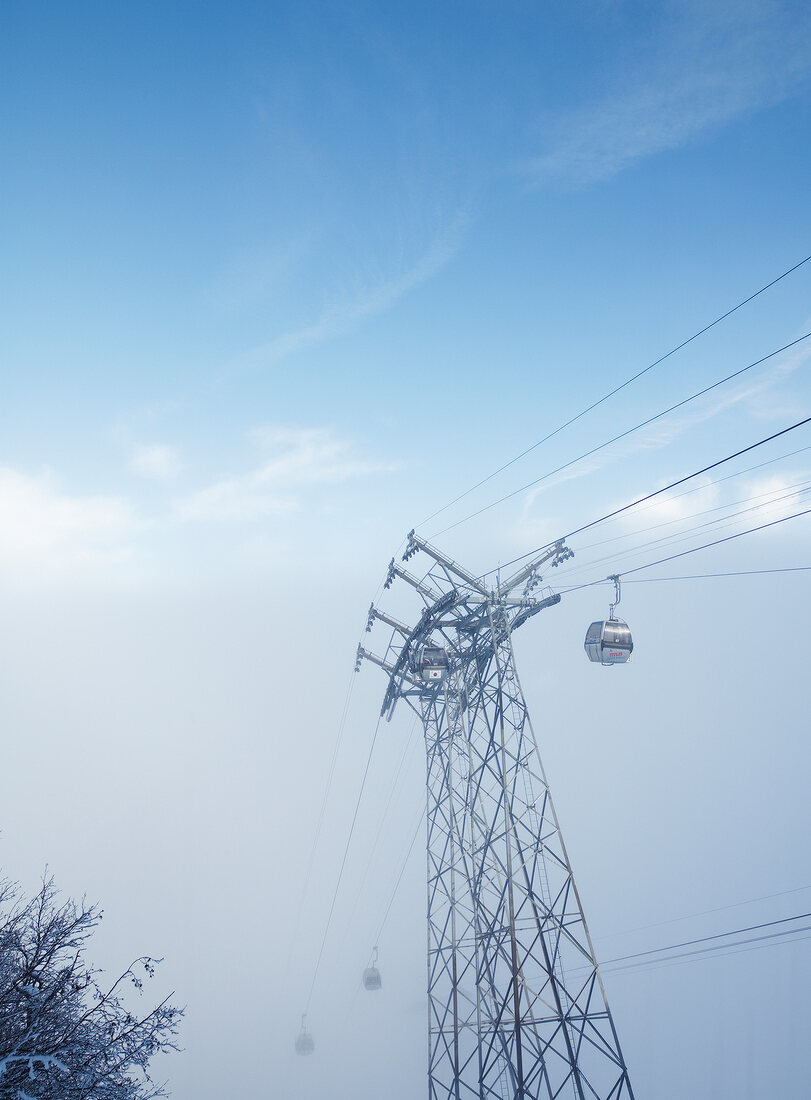 View of fog with Titlis Gondola in Uri Alps, Engelberg, Switzerland