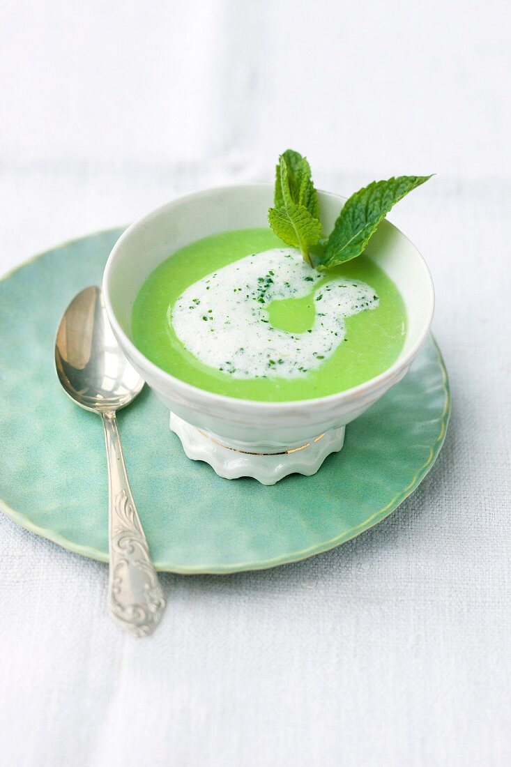 Cream of pea soup with mint foam