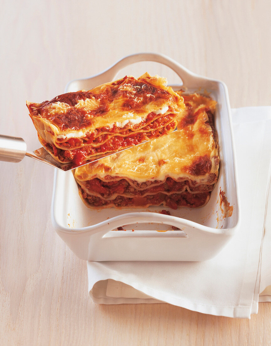 Piece of lasagne pasta on spatula