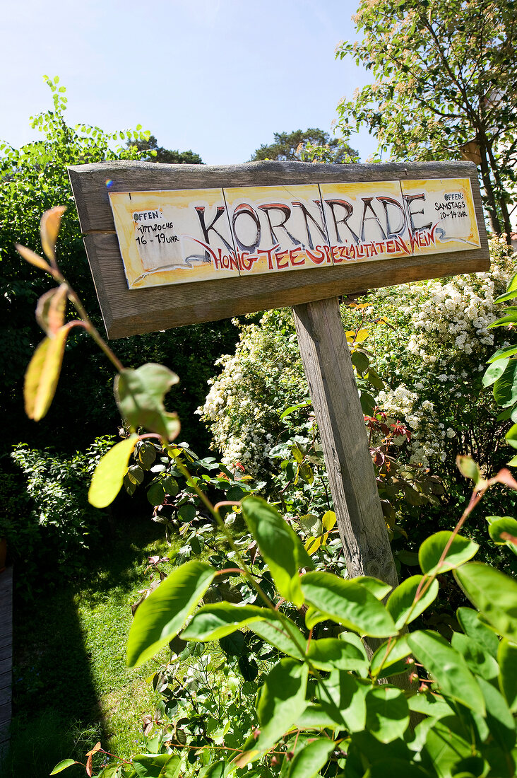 Close-up of Konrade organic beekeeping nameplate in Putbus, Rugen