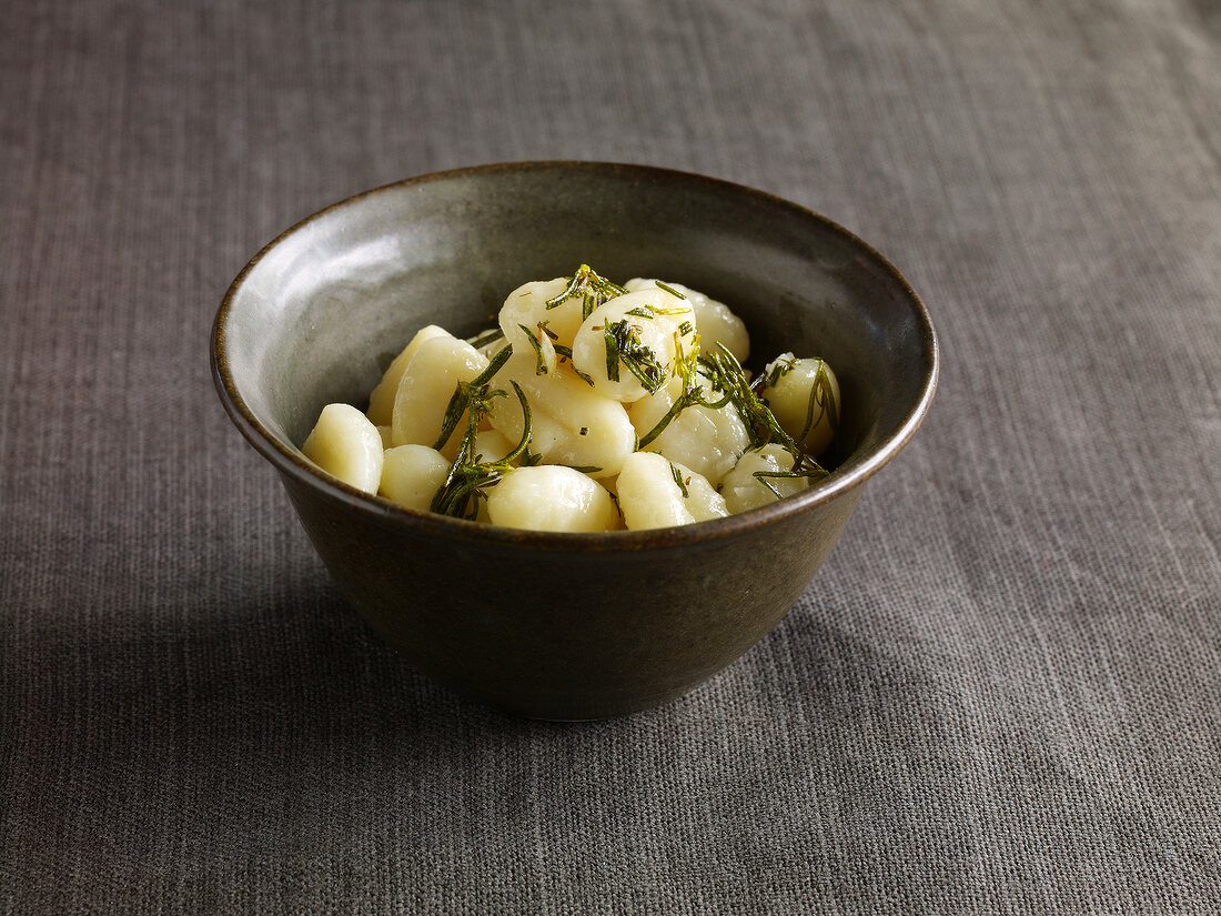 Gnocchi with rosemary in bowl 