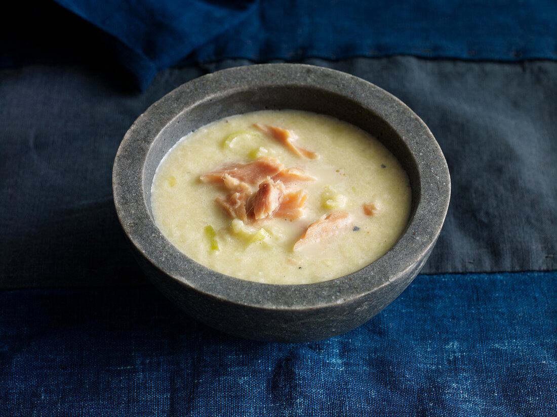 Leek soup with smoked trout in clay pot