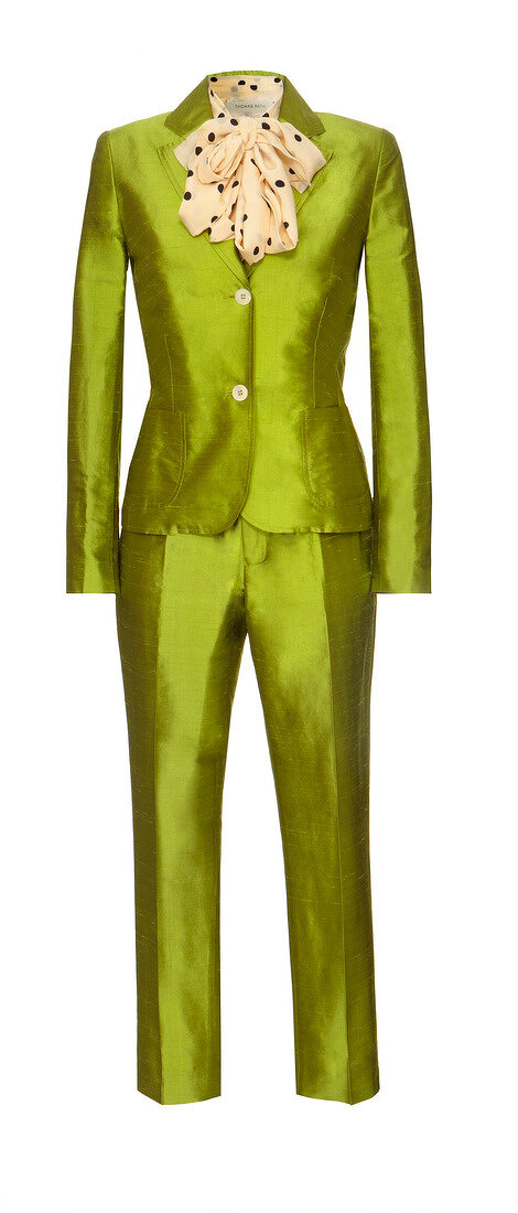 Close-up of green silk single-breasted coat and trousers on white background