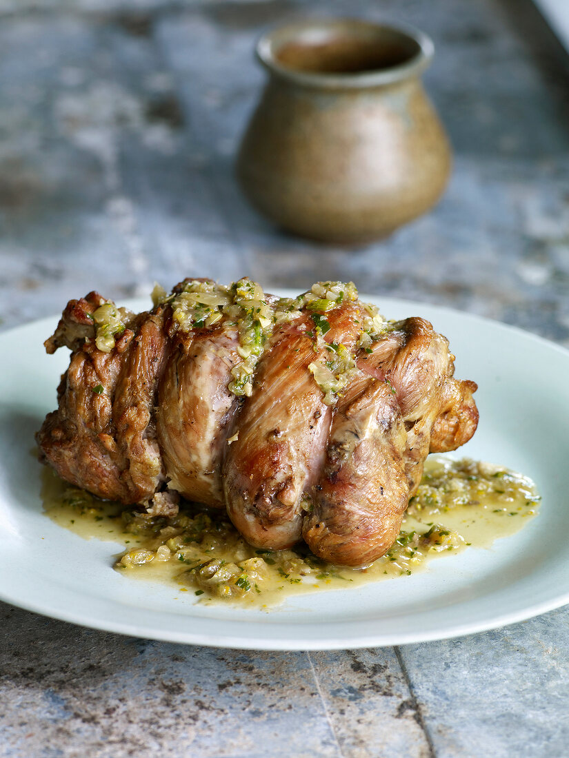 Close-up of roasted veal with orange gremolata on plate