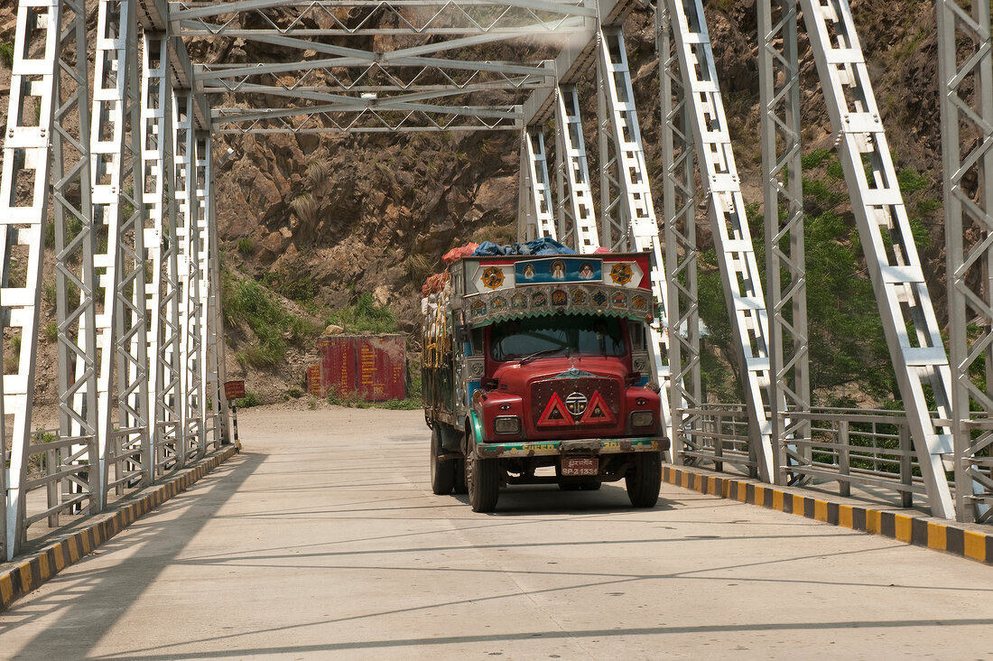 Truck passing through a bridge at Tashigang, Bhutan
