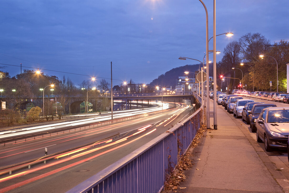 Light trails and cars on old bridge at Saarbrucken, Saarland, Germany