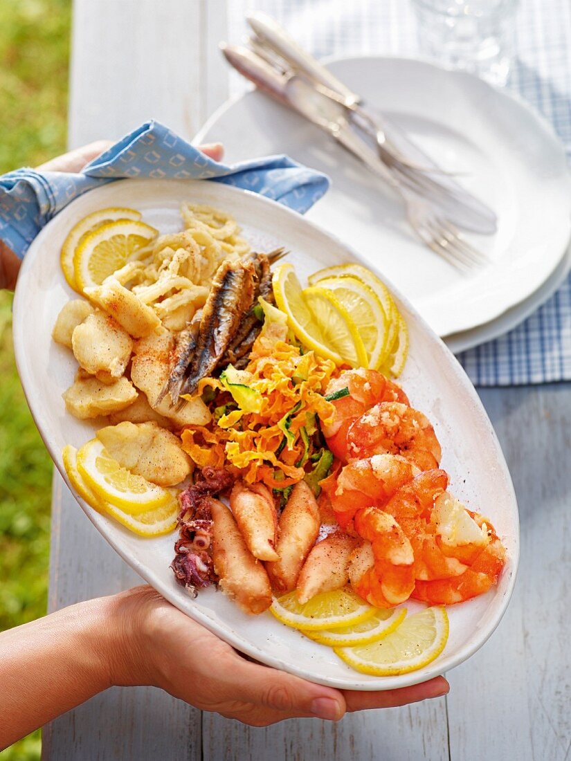 A serving platter of fried fish and seafood