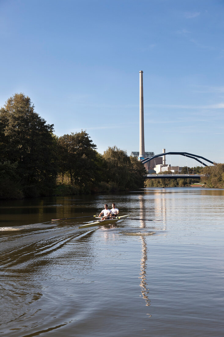 Jochen and Martin Kuehner rowing boat in Saarbrucken, Saarland, Germany