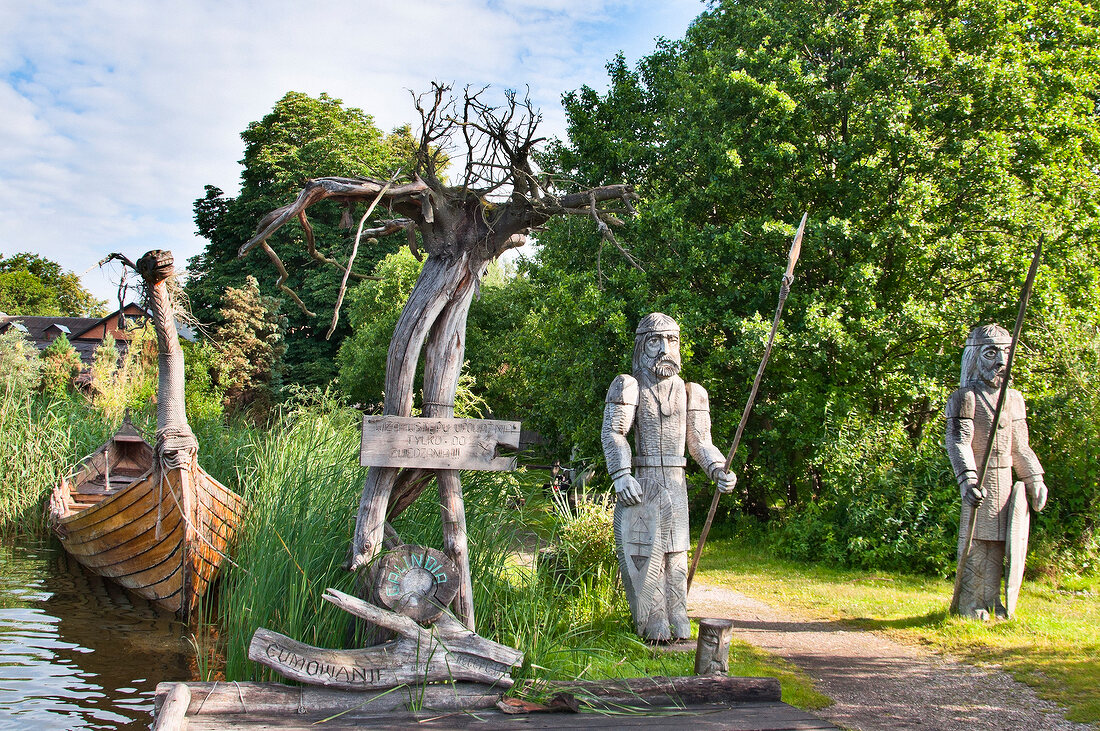 Two wooden sculptures in Galindia Mazurski Eden, Warmia Masuria, Poland