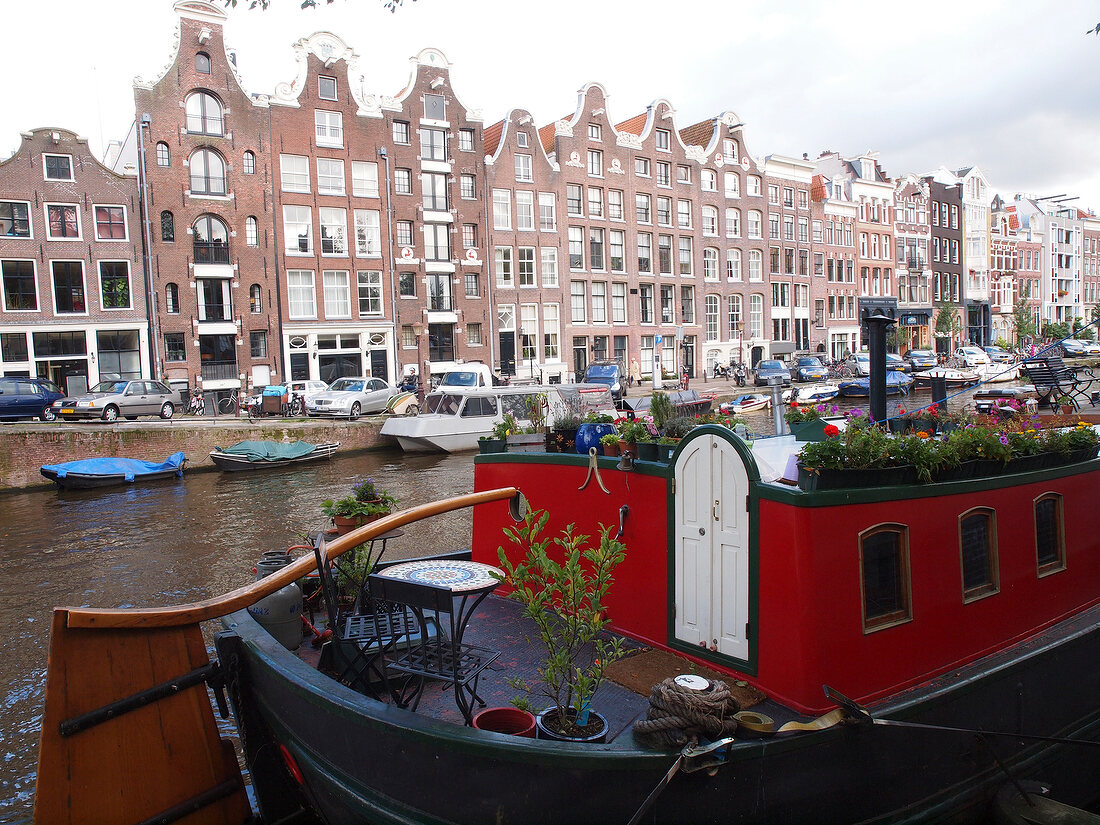 View of buildings and Barge in Prinsengracht, Amsterdam, Netherlands