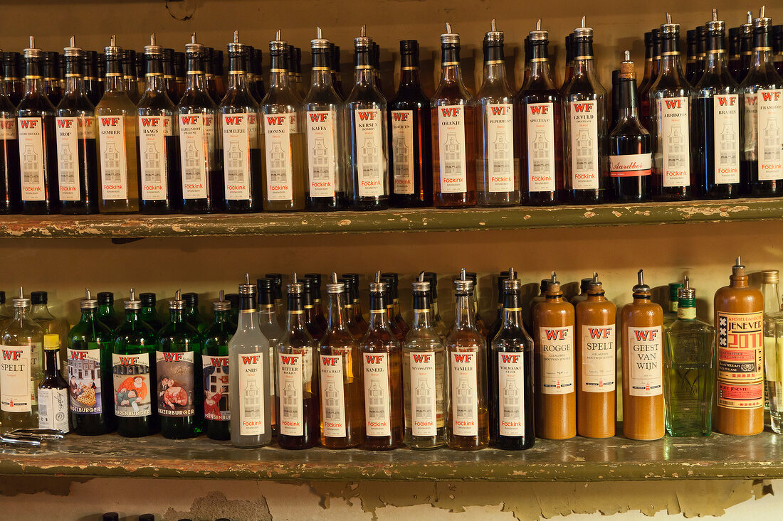 Gin bottles on shelf in Wynand Fockink Genever distillery, Pijlsteeg, Amsterdam
