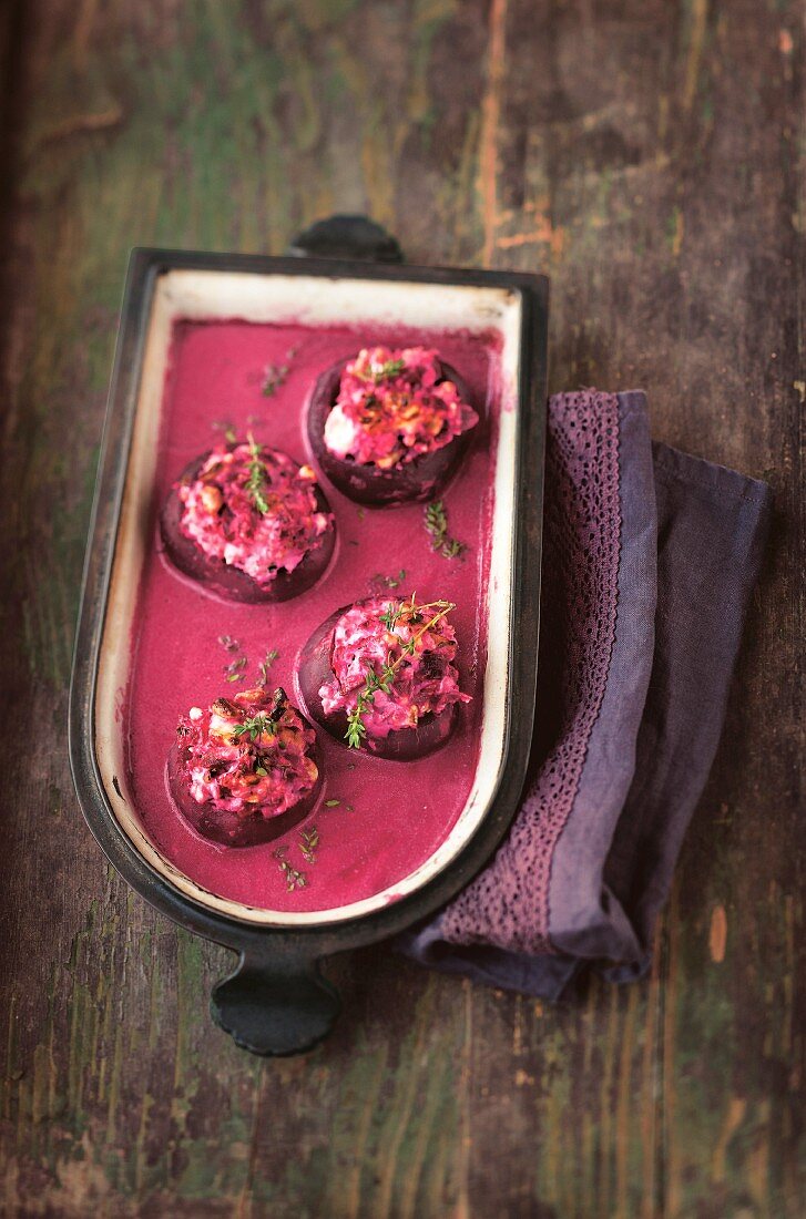 Stuffed beetroot in a baking tin