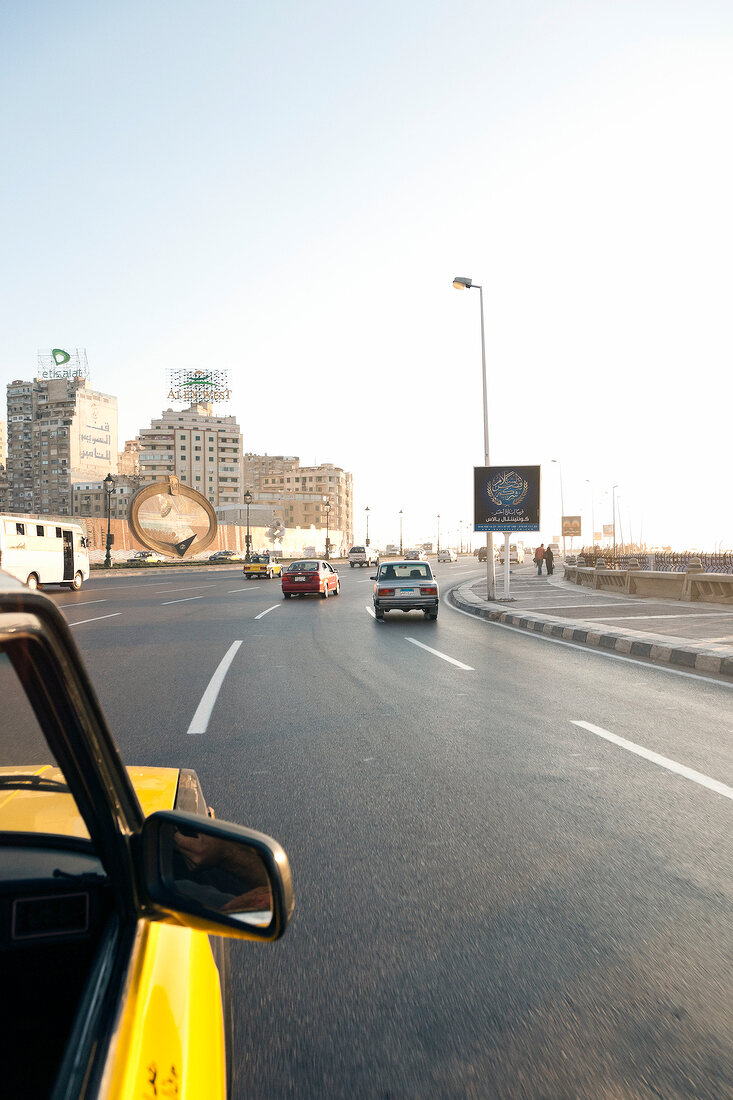 View of cars on road near Corniche in Alexandria, Egypt