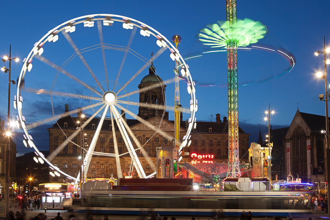 View of ferries wheel at fair in front of Royal Palace, Dam, Amsterdam, Netherlands