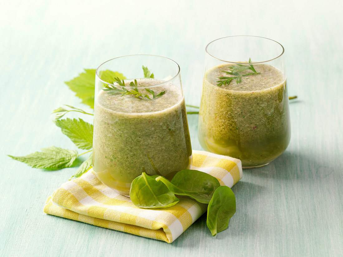 Glasses of sweet green smoothies