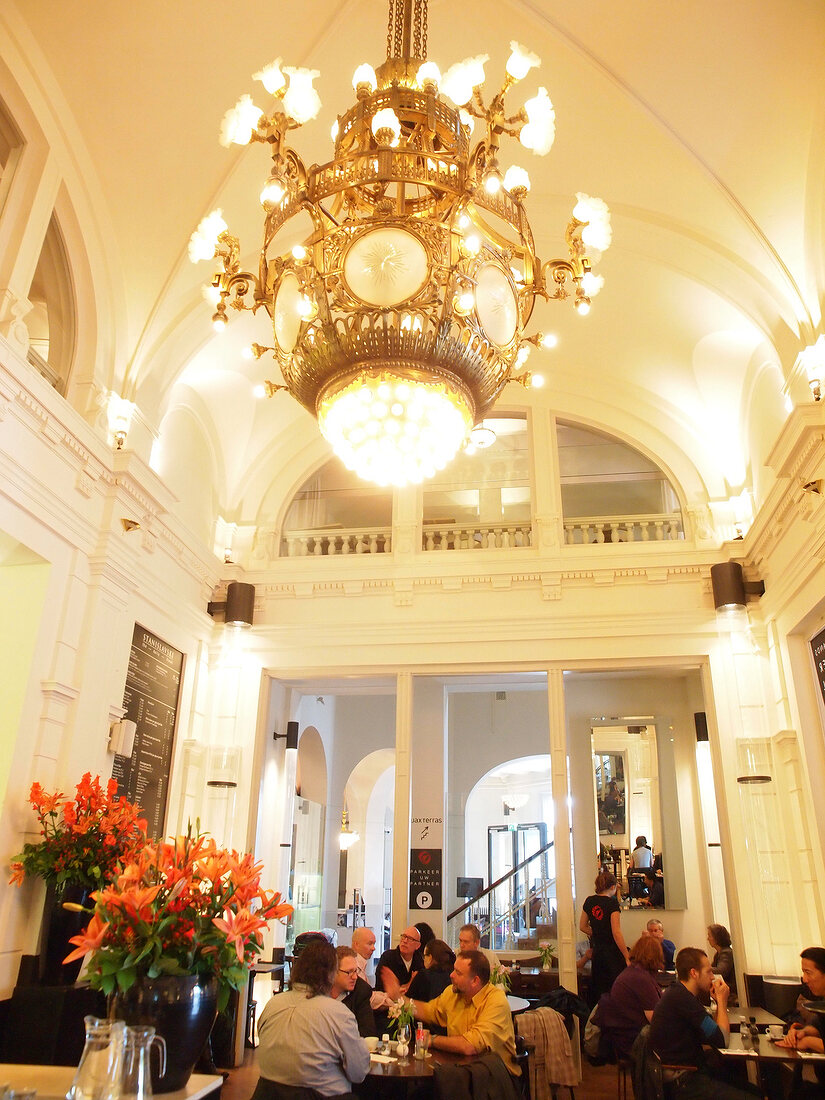 Guests at table in Stanislavski restaurant, Stadsschouwburg, Amsterdam, Netherlands