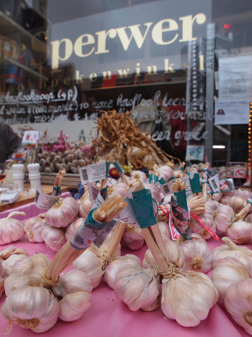 Garlic bulbs tied together outside De Sperwer, De Pijp, Gerard Doustraat 226, Amsterdam