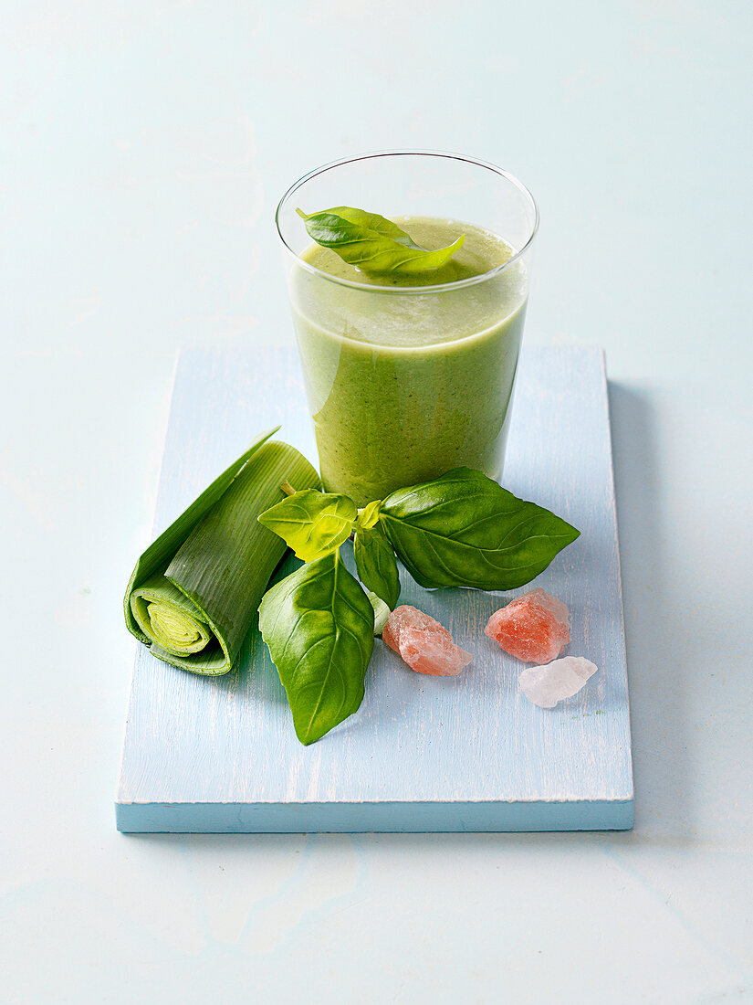 Glass of green smoothie for bowel cleansing