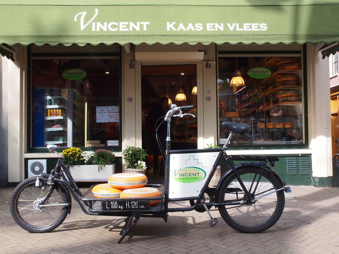 Bicycle in front of Vincent cheese shop at Nieuwmarkt, Amsterdam