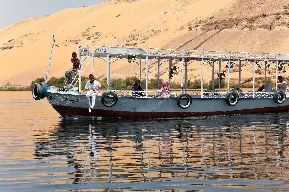 People travelling in ferry in Nile river, Aswan, Egypt