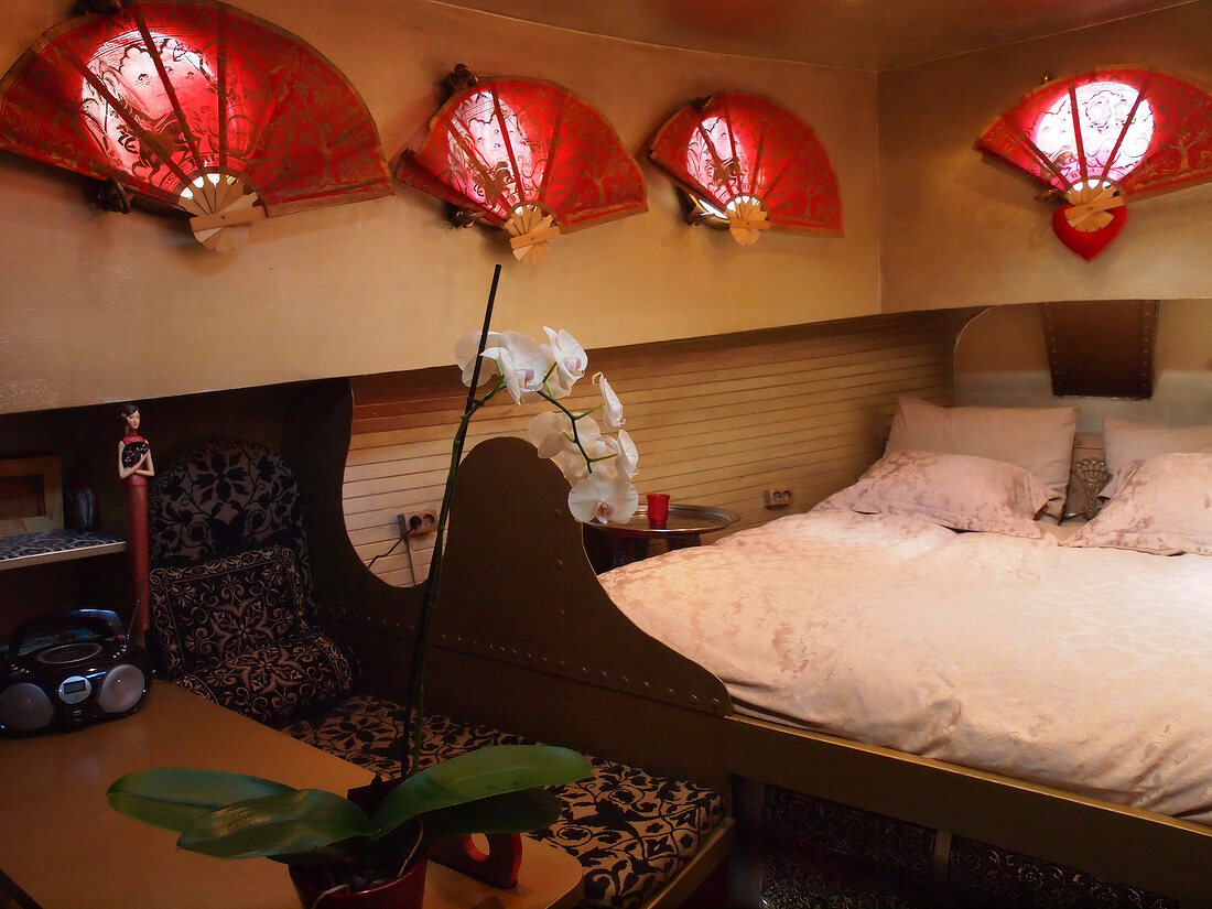 Interior of Bedroom in houseboat on Prinsengracht canal in Amsterdam, Netherlands