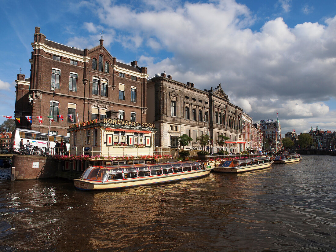 View of ferryboats at canal in Rokin, Amsterdam, Netherlands