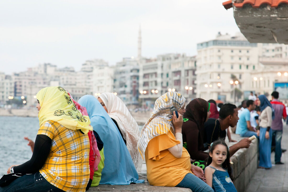 People at Corniche promenade in evening, Alexandria, Egypt