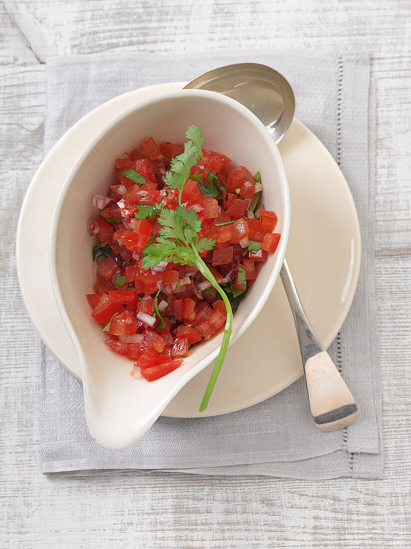 Tomato salsa in sauceboat