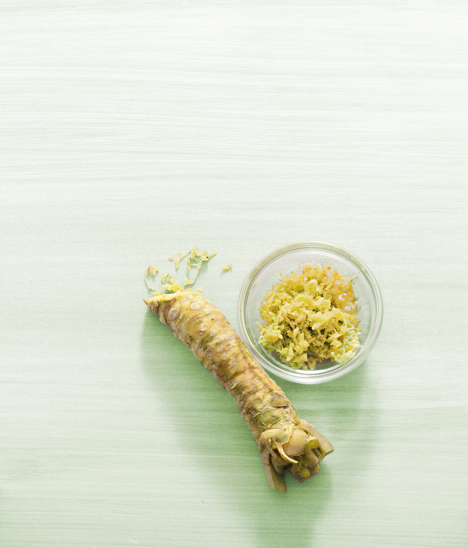 Japanese wasabi with grated wasabi root in bowl