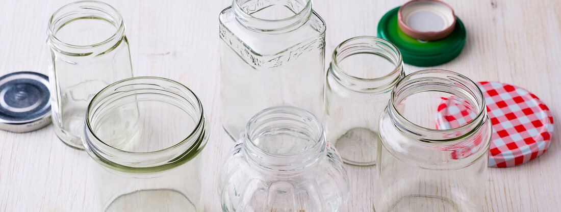 Different kinds of glass jar with screw top