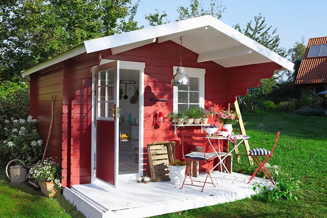 Red, wooden, Scandinavian-style summer house