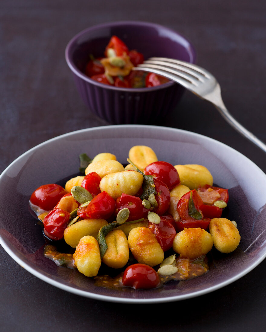 Gnocchi with sage tomato in bowl