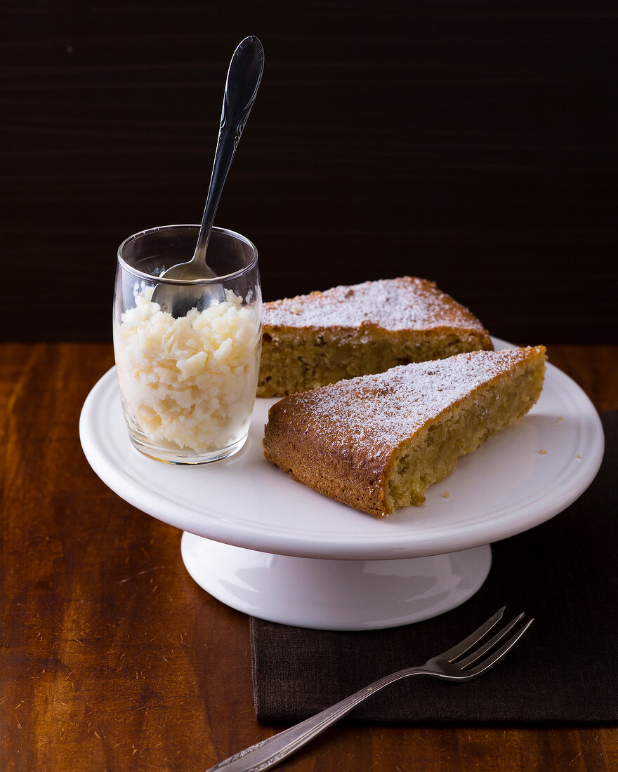 Almond cake with mandel granita on cake stand