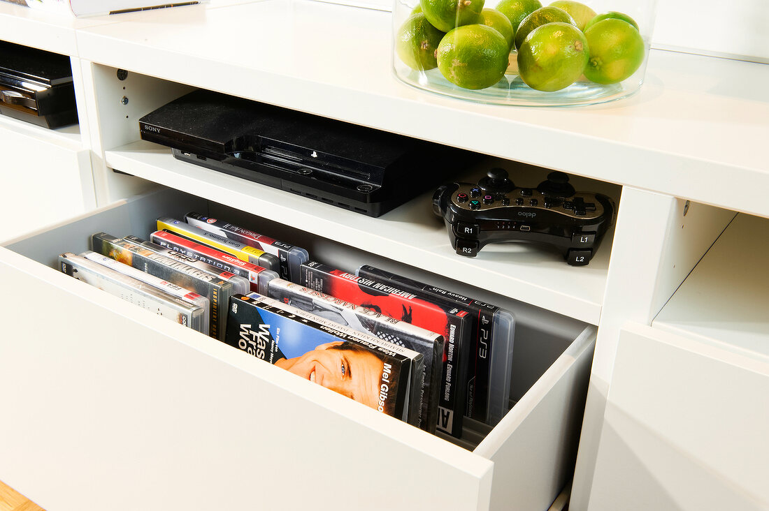 Living room with DVD holder, drawer and DVDs