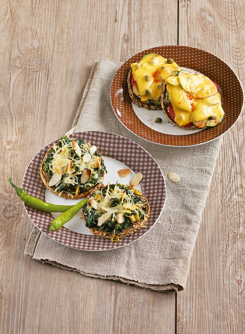 Vegetables and spinach toast on plates