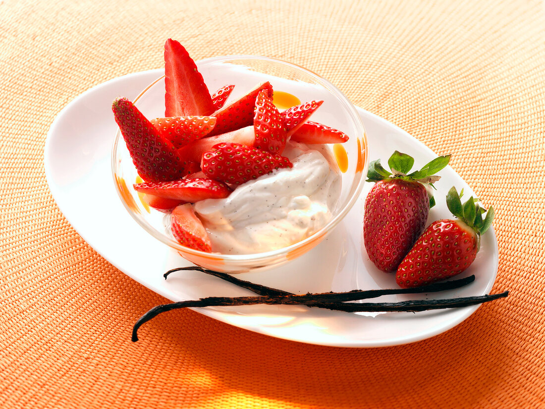 Strawberry with cheese in glass bowl